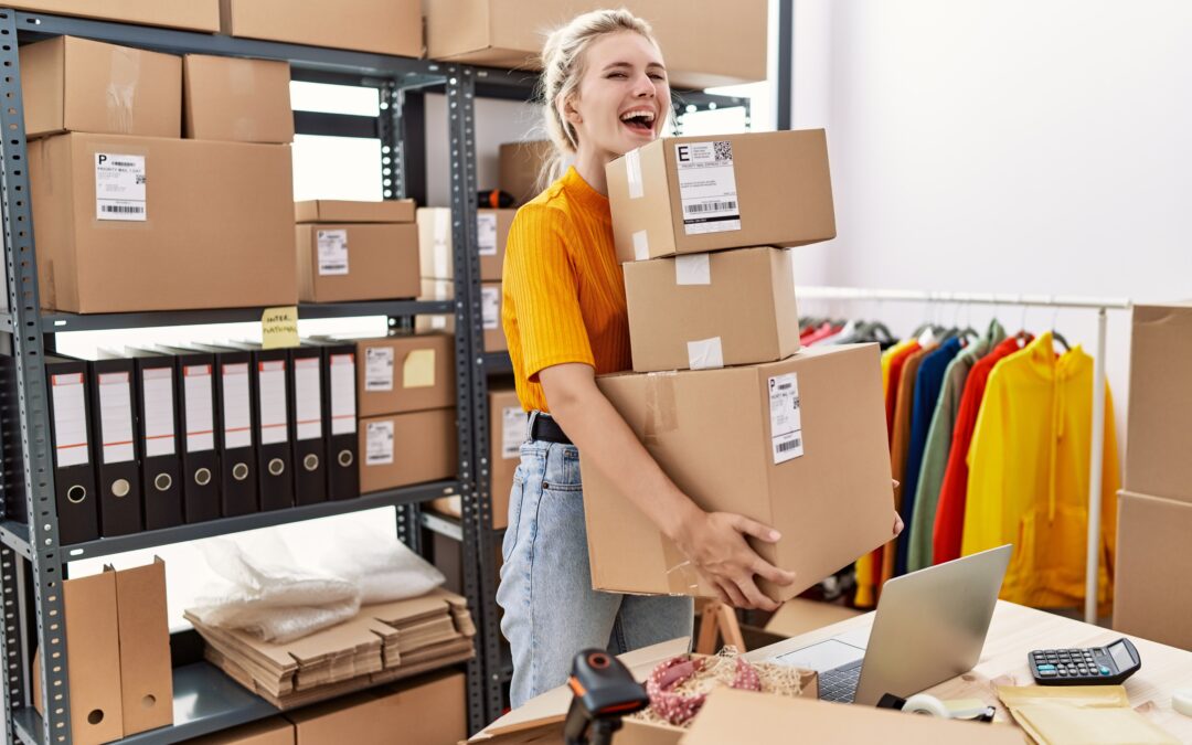 Business owner reviewing payroll reports and payslips with a payroll service provider